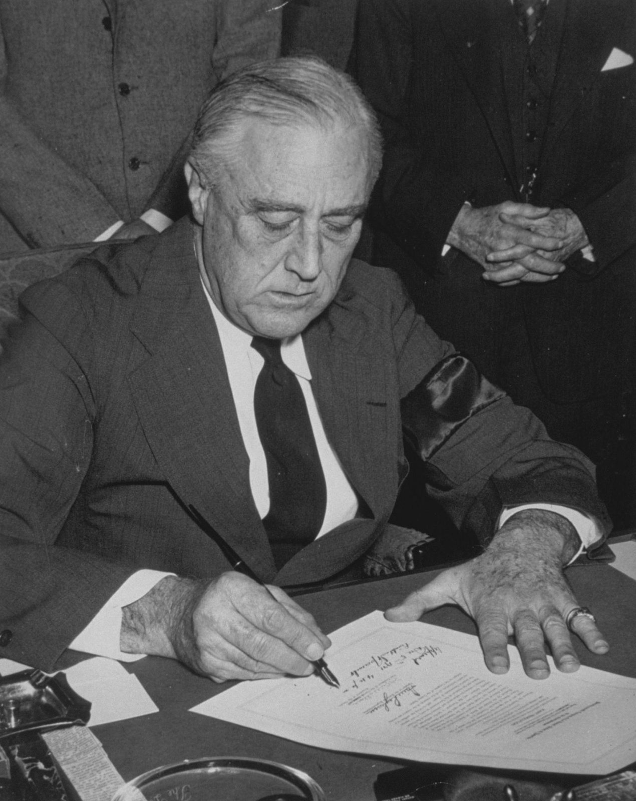 President Roosevelt signed the Joint Resolution declaring that a state of war existed between the United State