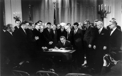President Lyndon Johnson signing the Civil Rights Act