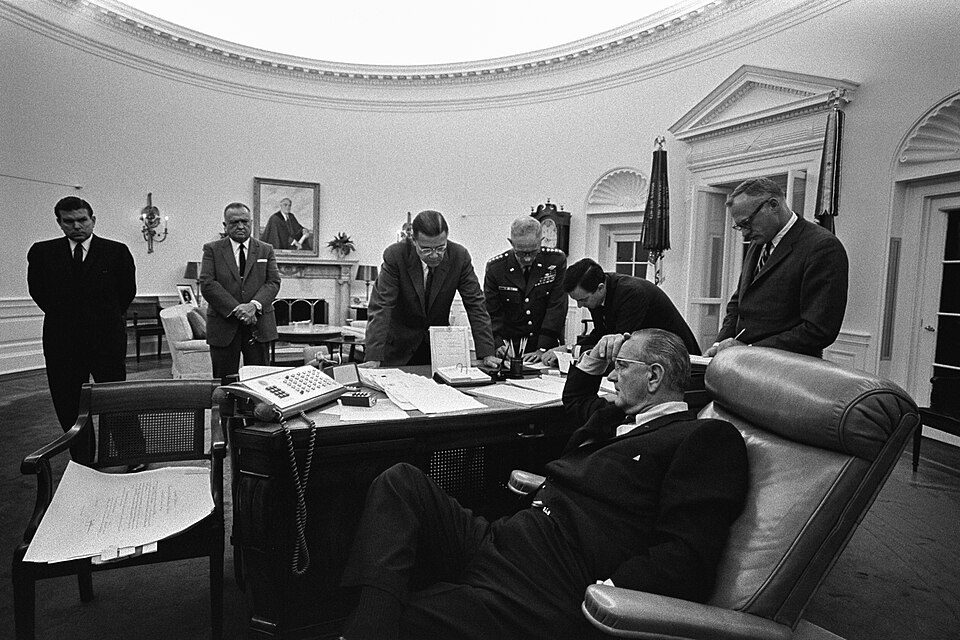 President Johnson meets with advisers about the Detroit uprising on July 24, 1967