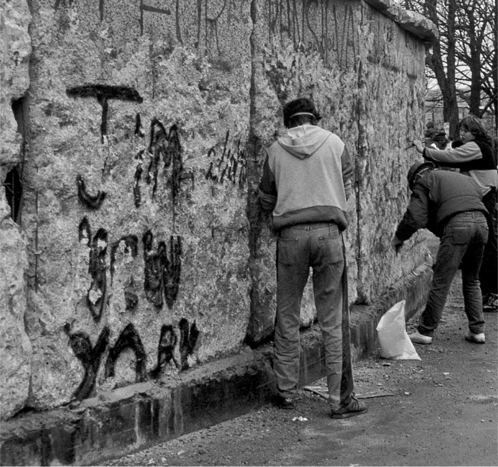 The Berlin Wall falls