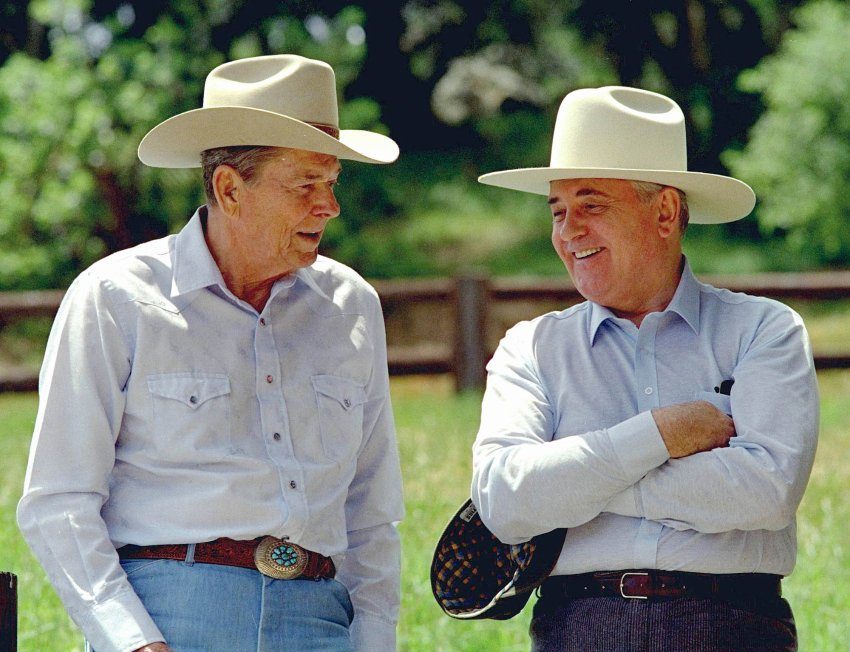 A couple of cowboys (Ronald Reagan and Mikhail Gorbachev) discuss ending the Cold War at Reagan's ranch in 199
